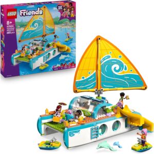 LEGO Friends Aventura en el Barco de Viaje - Barco de Juguete con Vela - 4 Mini Muñecos, 2 Figuras de Delfines y Accesorios Inc. Motos de Ag
